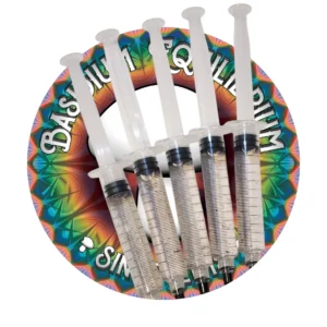 Collection of five diverse spore syringes, showcasing a variety of Psilocybe strains for microscopy and study.