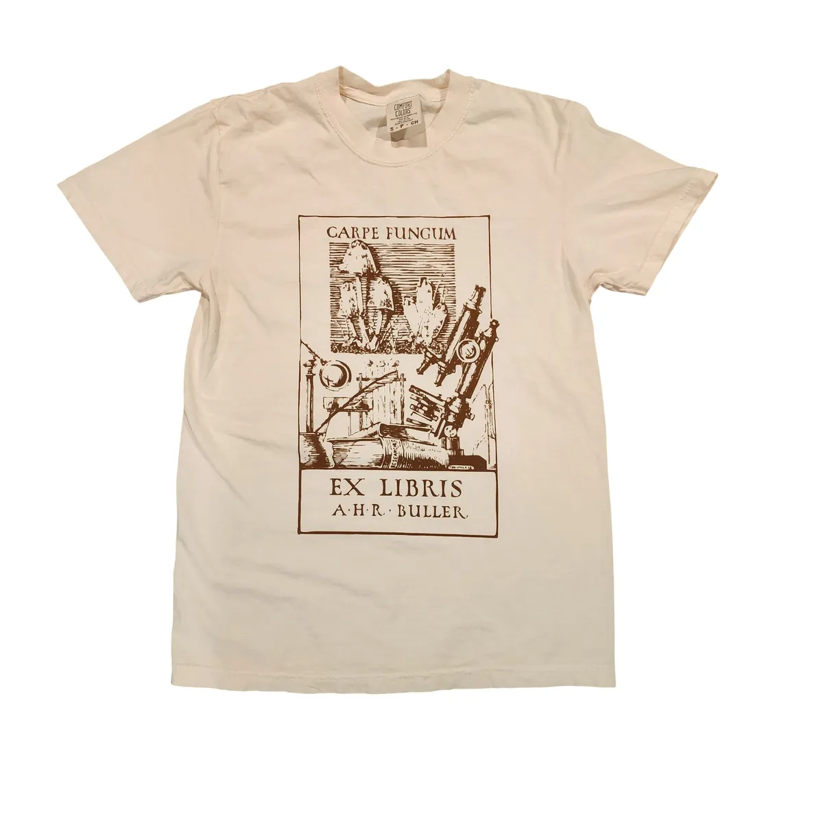 Cream color - Close-up of the Carpe Fungum shirt design showcasing intricate mushroom illustrations from early 20th-century scientific artwork.